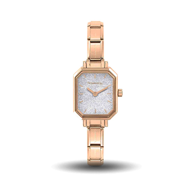 Rose gold watch with a glittery face on a white background