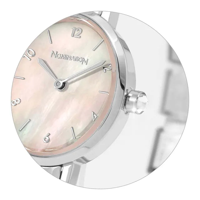 Nomination watch with a pink face and silver casing on a white background