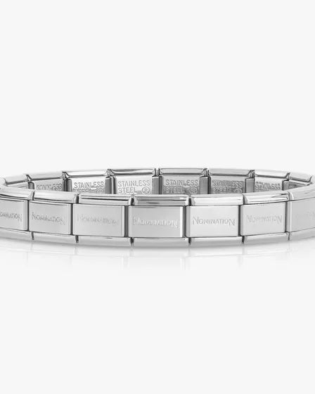 Silver bracelet with engraved text on a white background