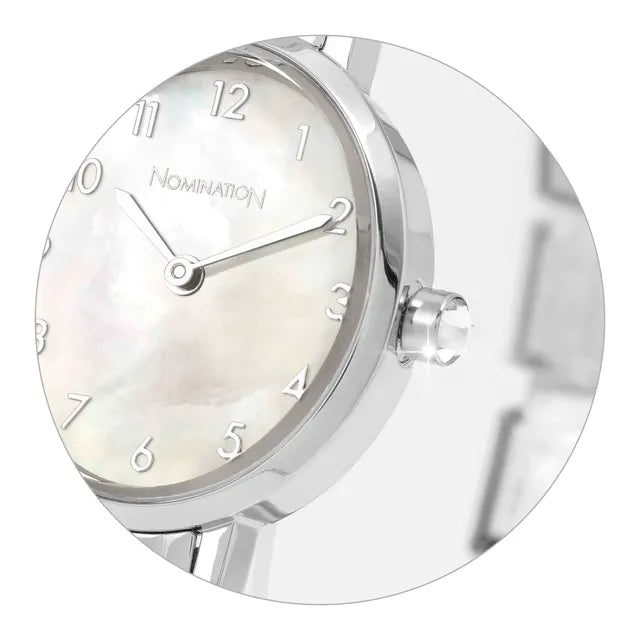 Silver watch with a white face on a white background