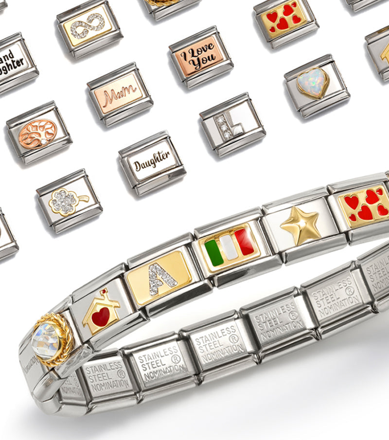 A Classic Nomination Italy Composable® Charm bracelets with assorted colorful charms. 