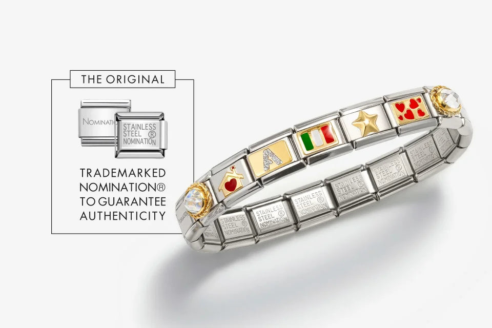 Bracelet with various symbols on a white background, featuring the brand 'Ninomi'.