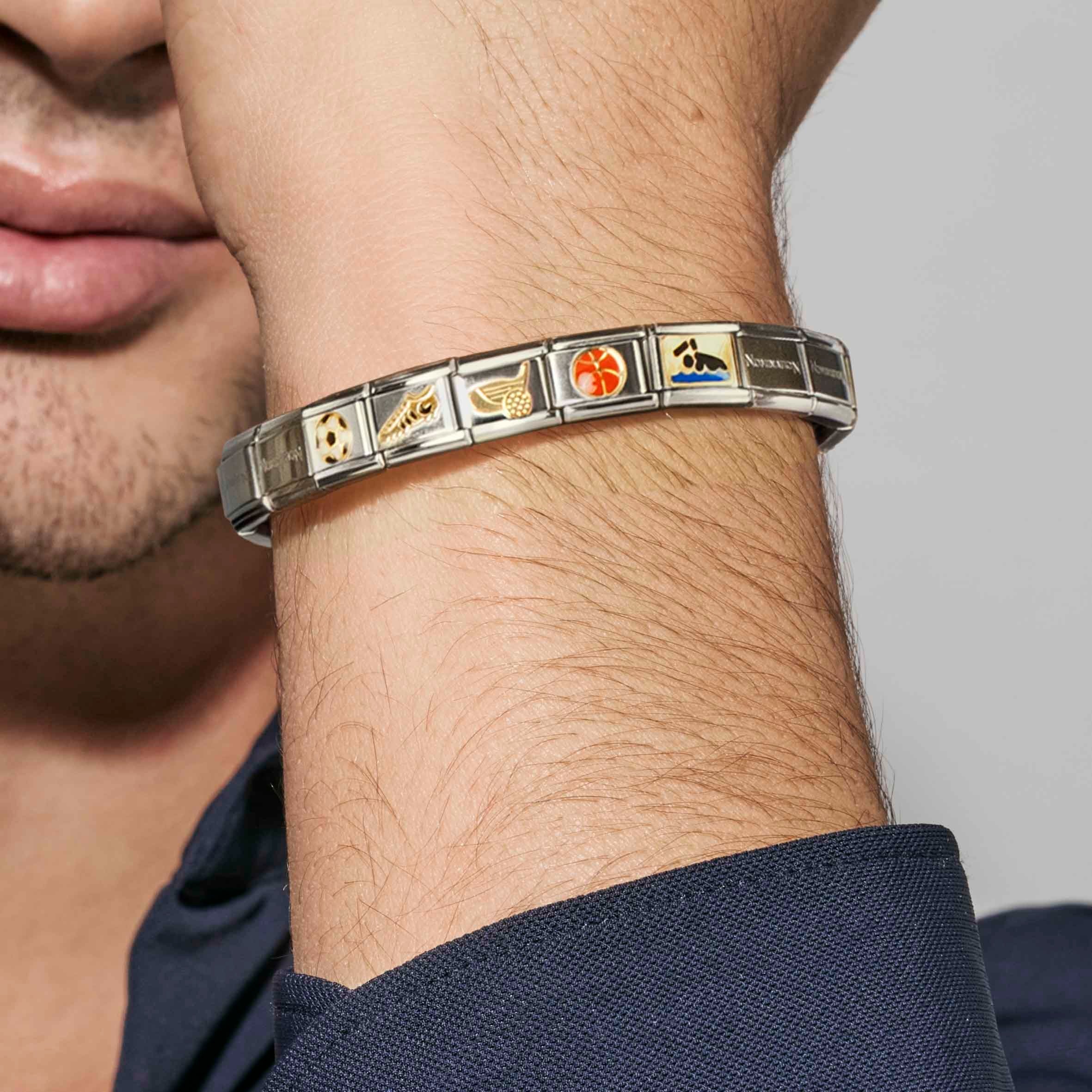 Nomination Italy charms and links bracelet on man's wrist