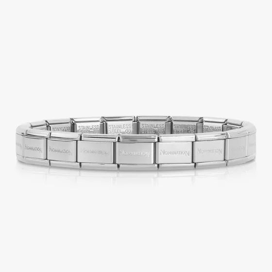 Silver bracelet with engraved text on a white background